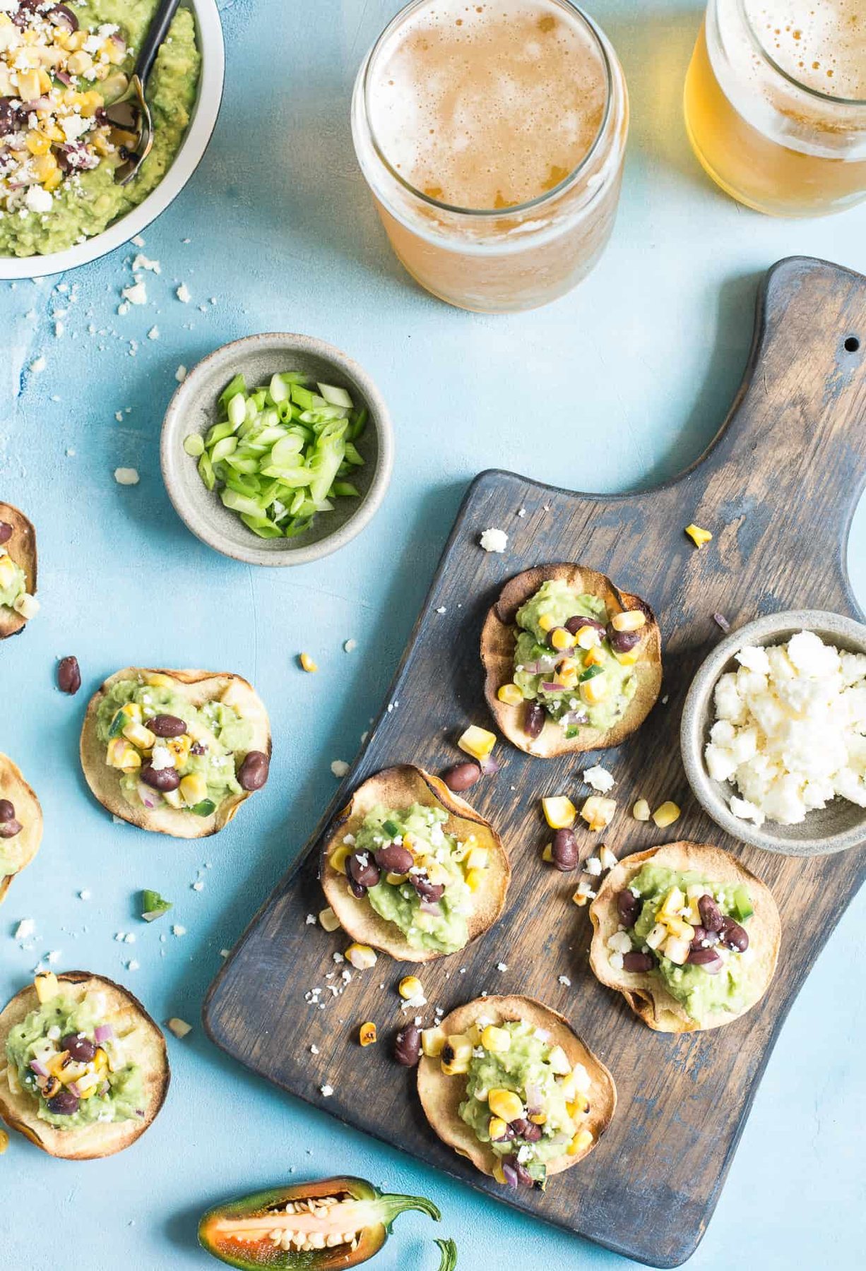Grilled Corn Salsa & Guacamole Tostadas: This crispy bite-sized appetizer is perfect for football season. They're gluten-free and healthy with a vegan option.