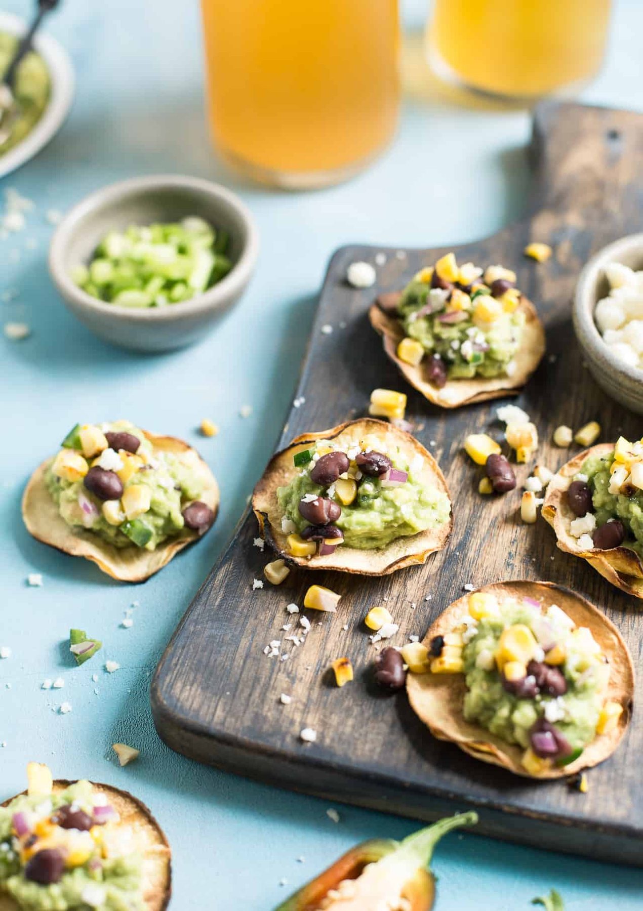 Grilled Corn Salsa & Guacamole Tostadas: This crispy bite-sized appetizer is perfect for football season. They're gluten-free and healthy with a vegan option.