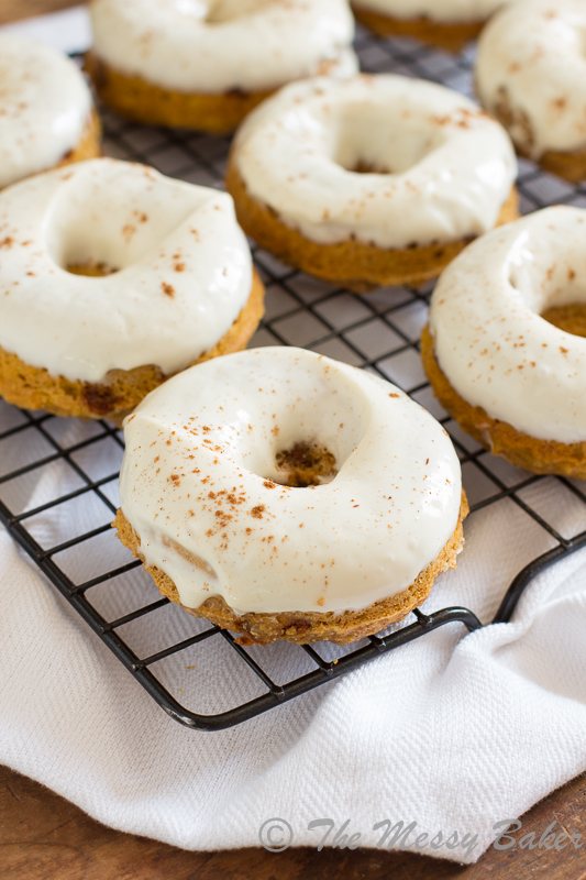Skinny Pumpkin Cinnamon Chip Donuts with Maple Cream Cheese Glaze | www.themessybakerblog.com -8483