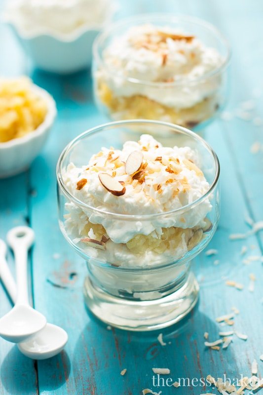 Pina Colada Fool | This no-bake dessert is layered with whipped cream, sweet pineapple, and toasted coconut and almonds. It's ready to serve in 10 minutes.