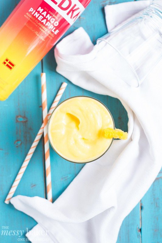 Pineapple Mango Slush Cocktail | www.themessybakerblog.com
