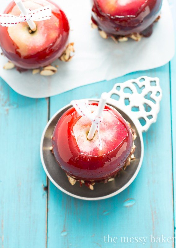 Red Moscato Candied Apples Dipped in Toasted Almonds and Semi-Sweet Chocolate | www.themessybakerblog.com