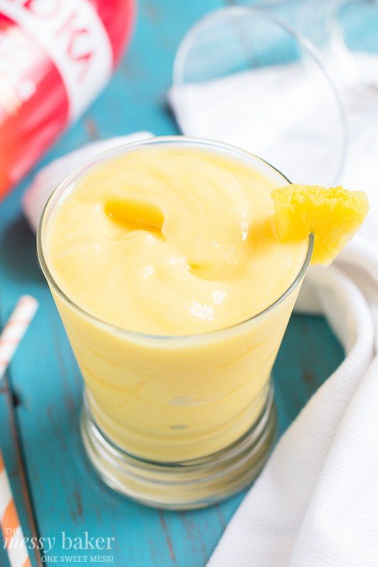 Pineapple Mango Slush Cocktail | www.themessybakerblog.com