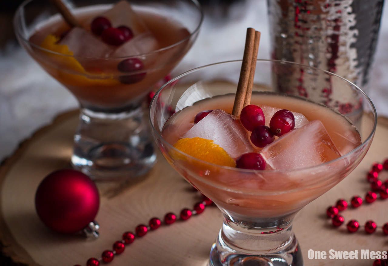Spiced Cranberry Rum Old-Fashioned: Spiced rum, tart cranberry juice, and warm cinnamon and cloves get shaken to create a festive holiday cocktail perfect for celebrating New Year's Eve.