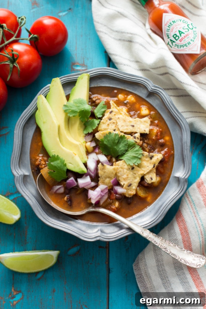 Close-up of Chorizo Taco Soup with corn and beans