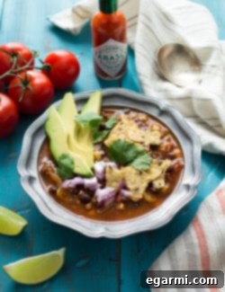 Final bowl of Chorizo Taco Soup with all the delicious toppings