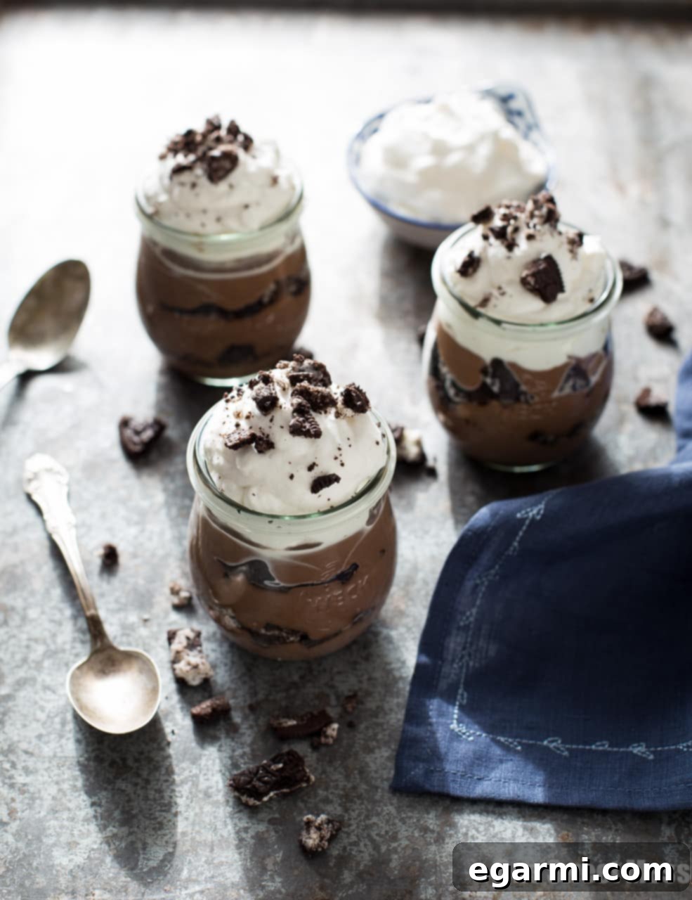 Cookies & Cream Pudding Cups: Layers of homemade chocolate pudding, crunchy Oreo cookies, and homemade vanilla bean whipped cream.