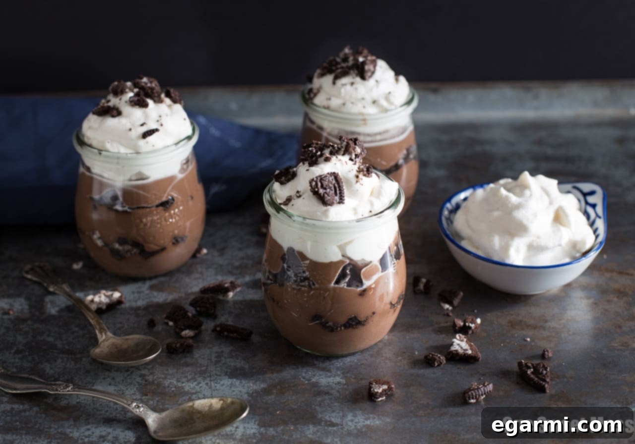 Cookies & Cream Pudding Cups: Layers of homemade chocolate pudding, crunchy Oreo cookies, and homemade vanilla bean whipped cream.