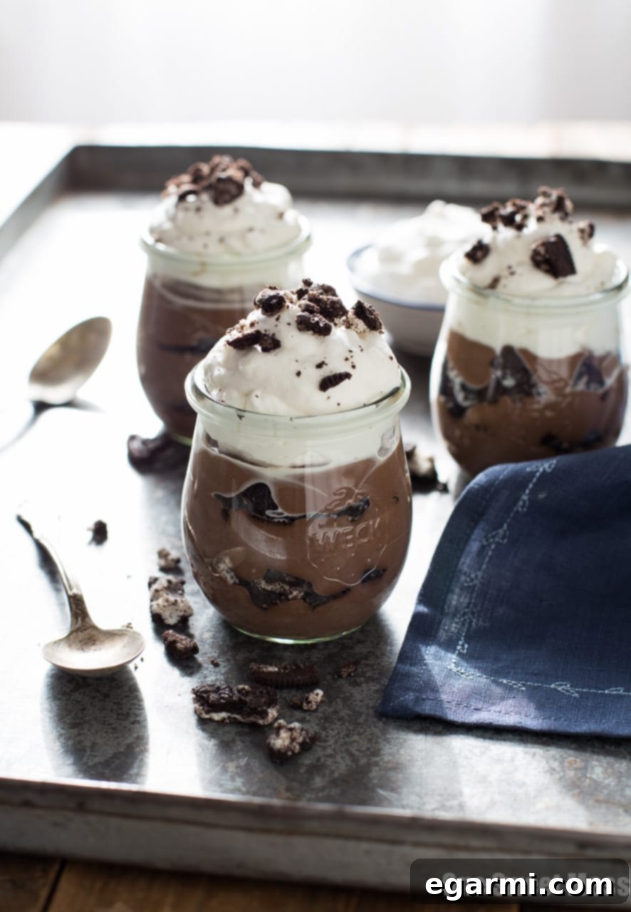 Cookies & Cream Pudding Cups: Layers of homemade chocolate pudding, crunchy Oreo cookies, and homemade vanilla bean whipped cream.