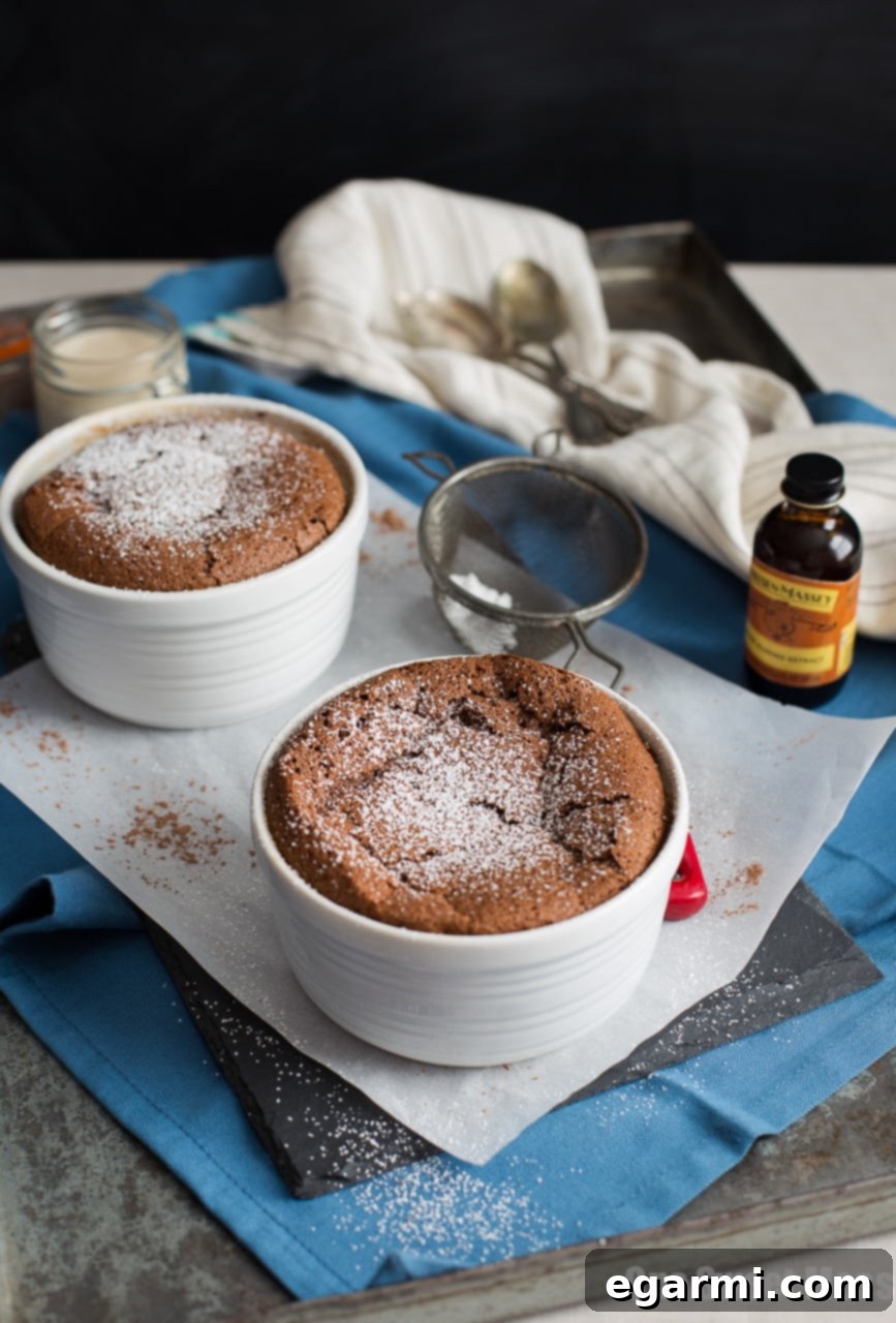 Close-up of a perfectly risen Chocolate Almond Soufflé, ready for glazing