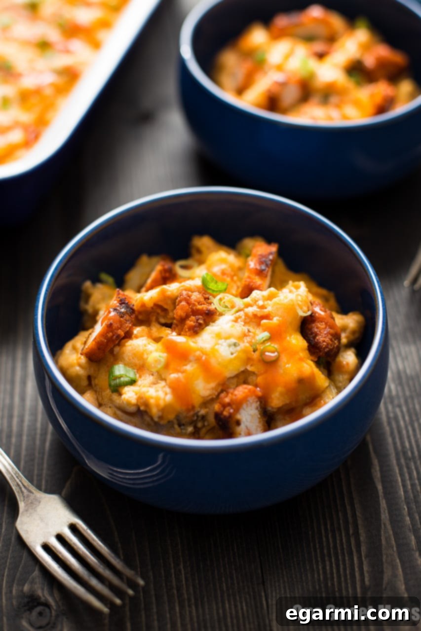 Hearty Serving of Buffalo Chicken Mac and Cheese with Scallions