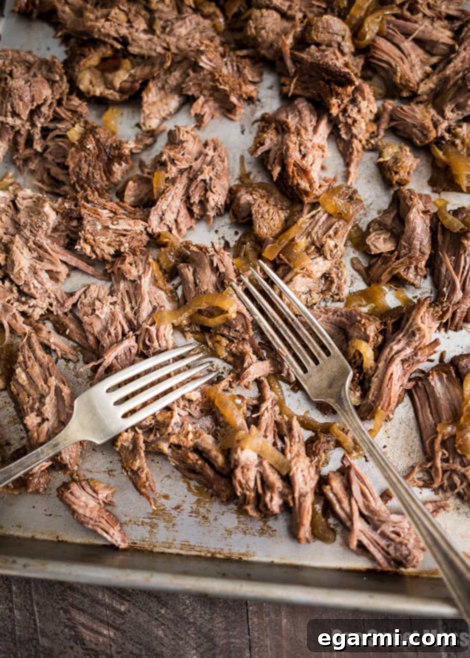 Close-up of Slow Cooker Guinness Shredded Beef ready for shredding