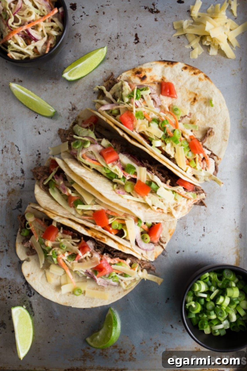 Tender Guinness Shredded Beef Tacos with Tangy Mustard Slaw for a Fun Dinner