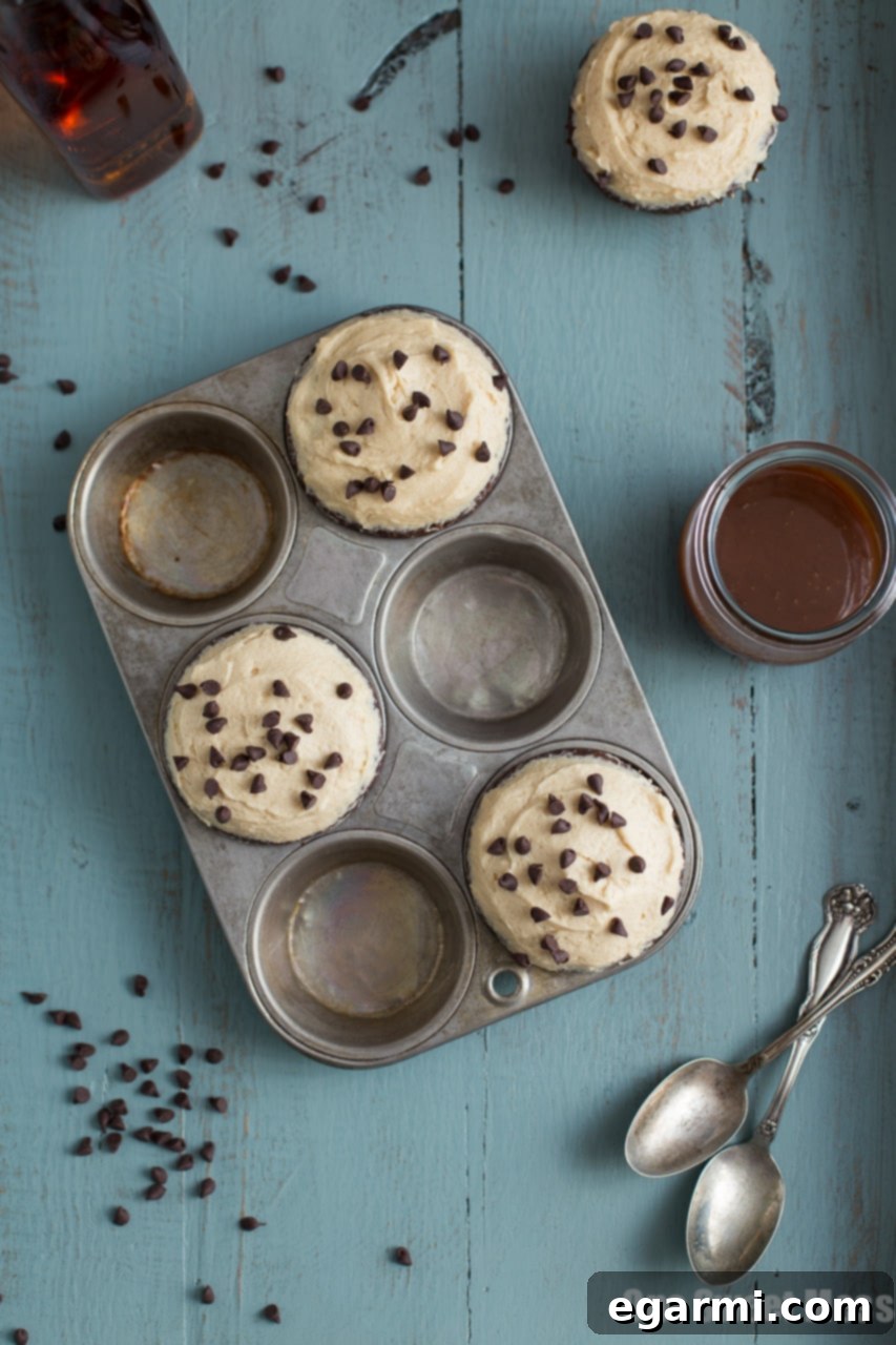 A quartet of Chocolate Stout Cupcakes with luscious Whiskey Caramel Buttercream, ready to enjoy