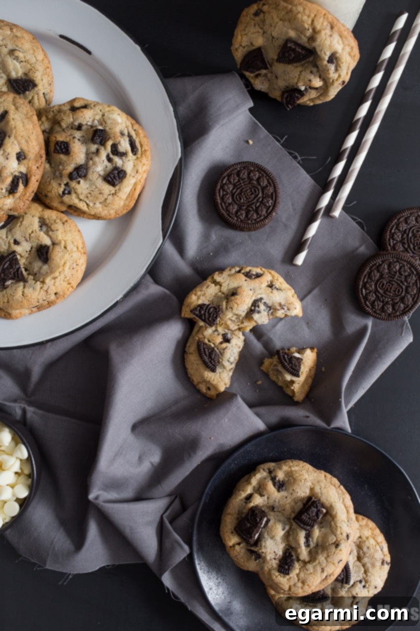 Close-up of baked Cookies & Cream Cookies showing soft interior and melted white chocolate