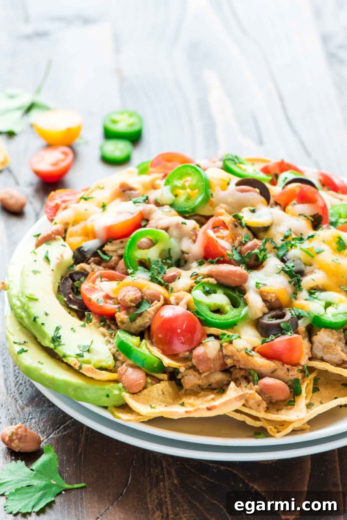Delicious and healthy Crock Pot Nachos loaded with toppings, perfect for a stress-free Monday dinner