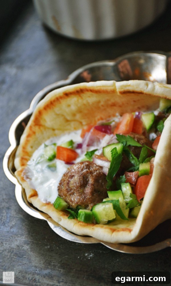 Mediterranean Meatball Gyros: Savory Lamb Meatballs in Warm Pita with Tzatziki