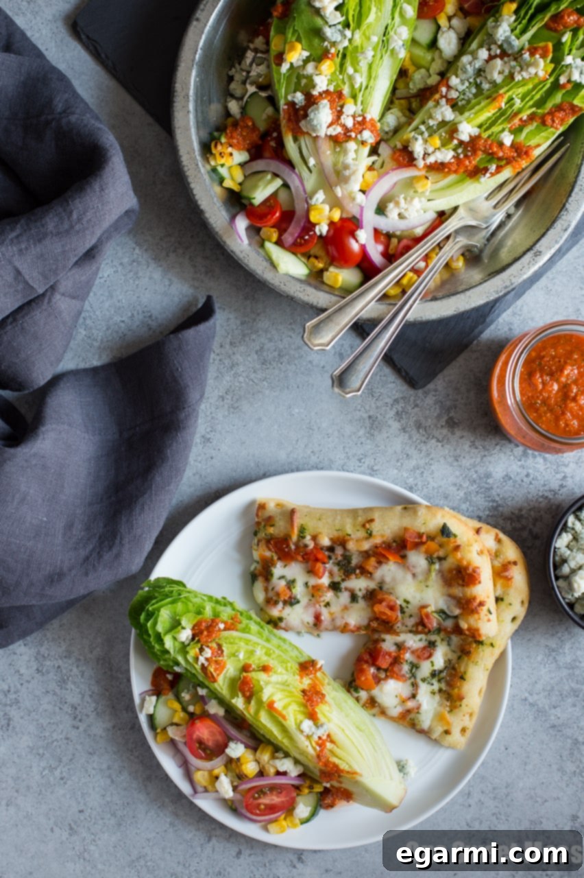 Grilled Corn & Tomato Salad with Roasted Red Pepper Vinaigrette on a plate