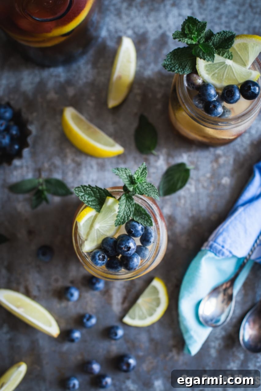 Variety of fresh berries and citrus fruits, perfect for sangria garnish