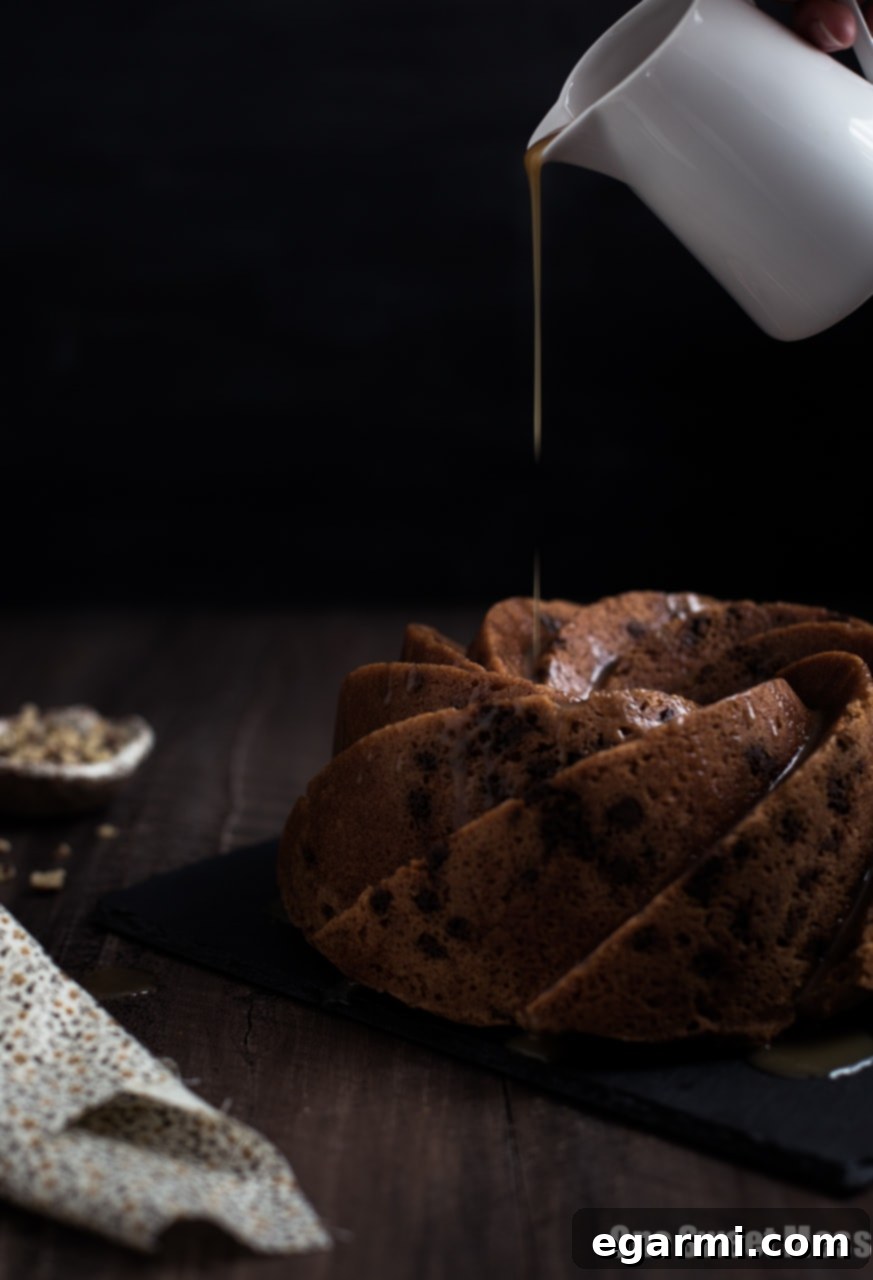 Close-up of the delectable Butterscotch Rum Glaze drizzled over the bundt cake.