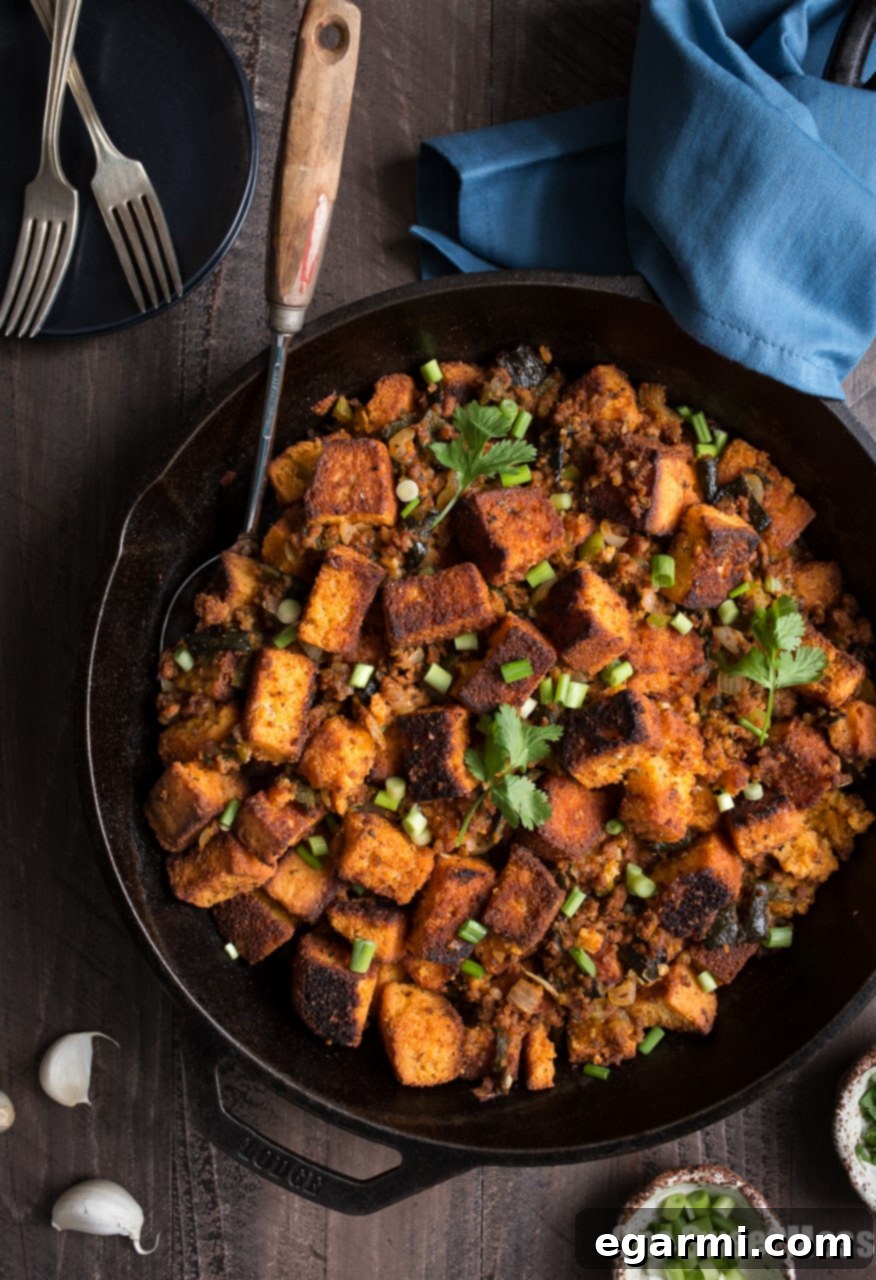 Spicy Roasted Poblano Chorizo Cornbread Stuffing 5 Close-up of golden brown cornbread stuffing with chorizo and poblano peppers