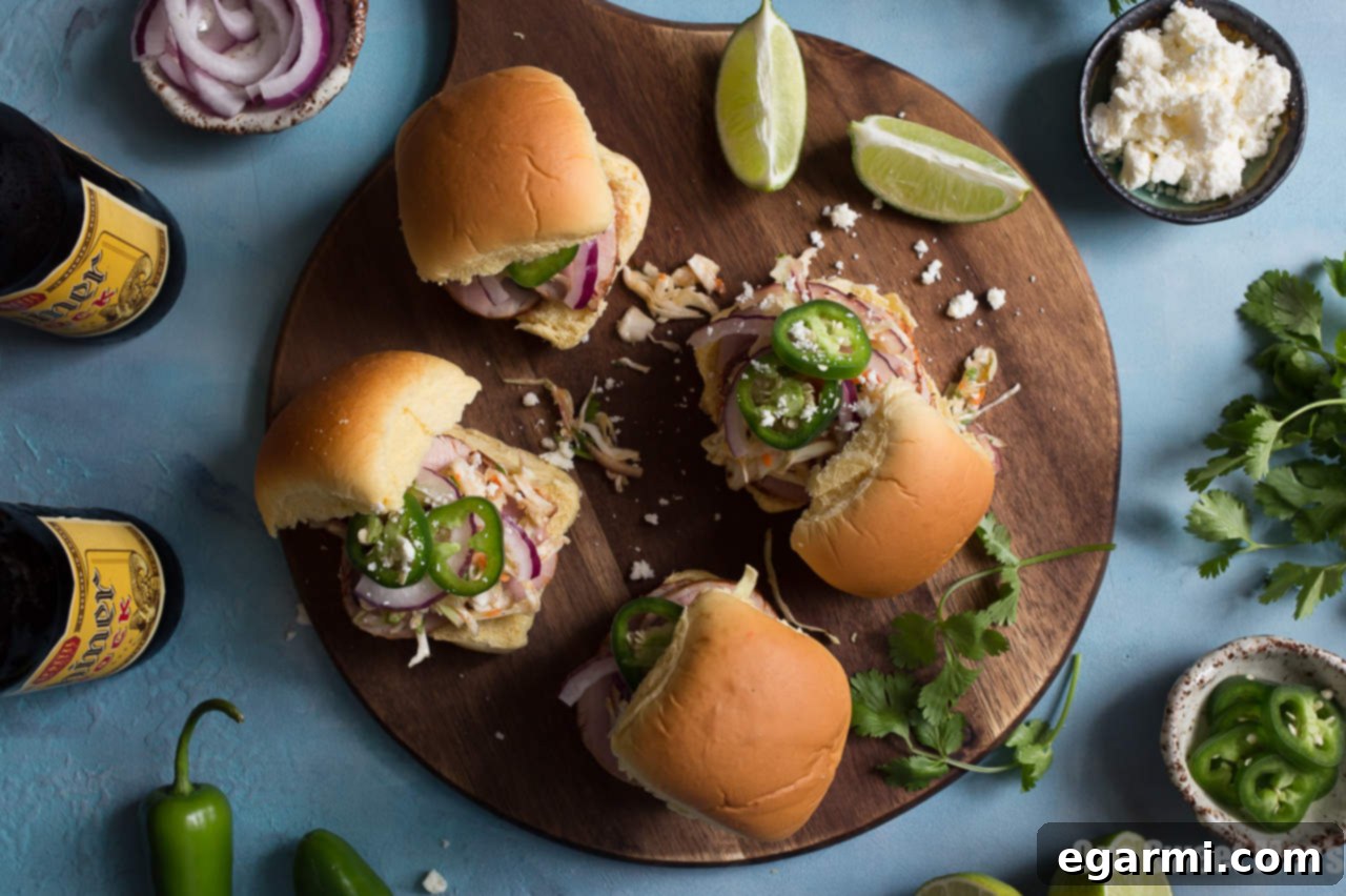 Close-up of ingredients for Chipotle Pork Sliders: pork, slaw, jalapenos, and queso fresco