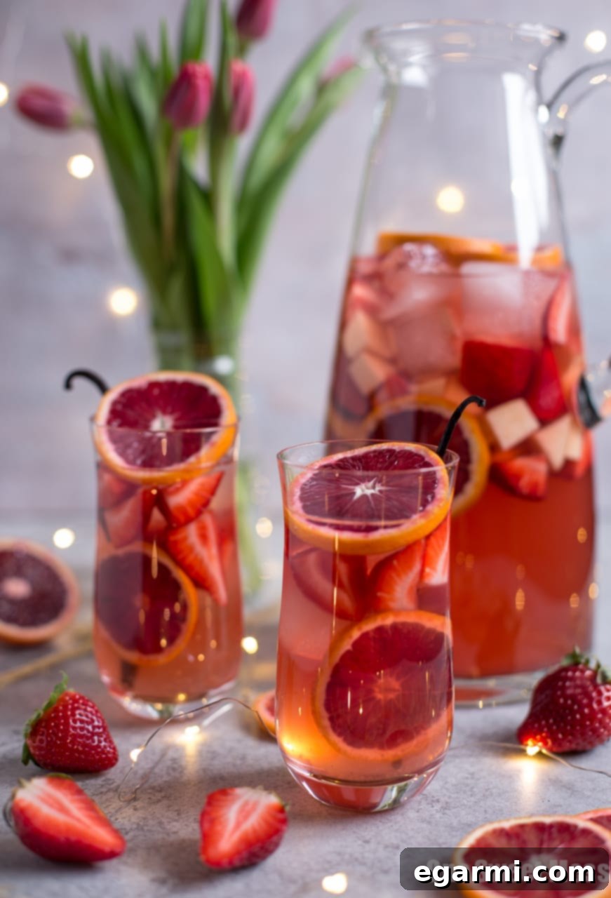 Velvet Citrus Rosé Sangria 3 Homemade Blood Orange Vanilla Bean Rosé Sangria in a glass