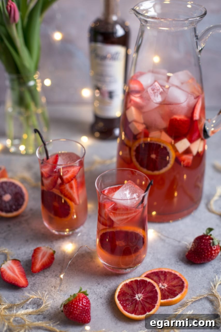 Velvet Citrus Rosé Sangria 4 Close-up of Blood Orange Vanilla Bean Rosé Sangria with fresh fruit