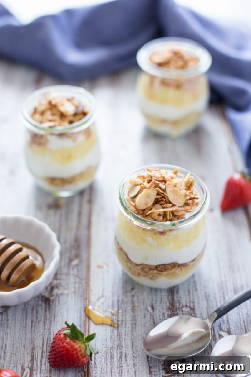 Pina Colada Yogurt and Honey Parfait in a glass, ready to be served