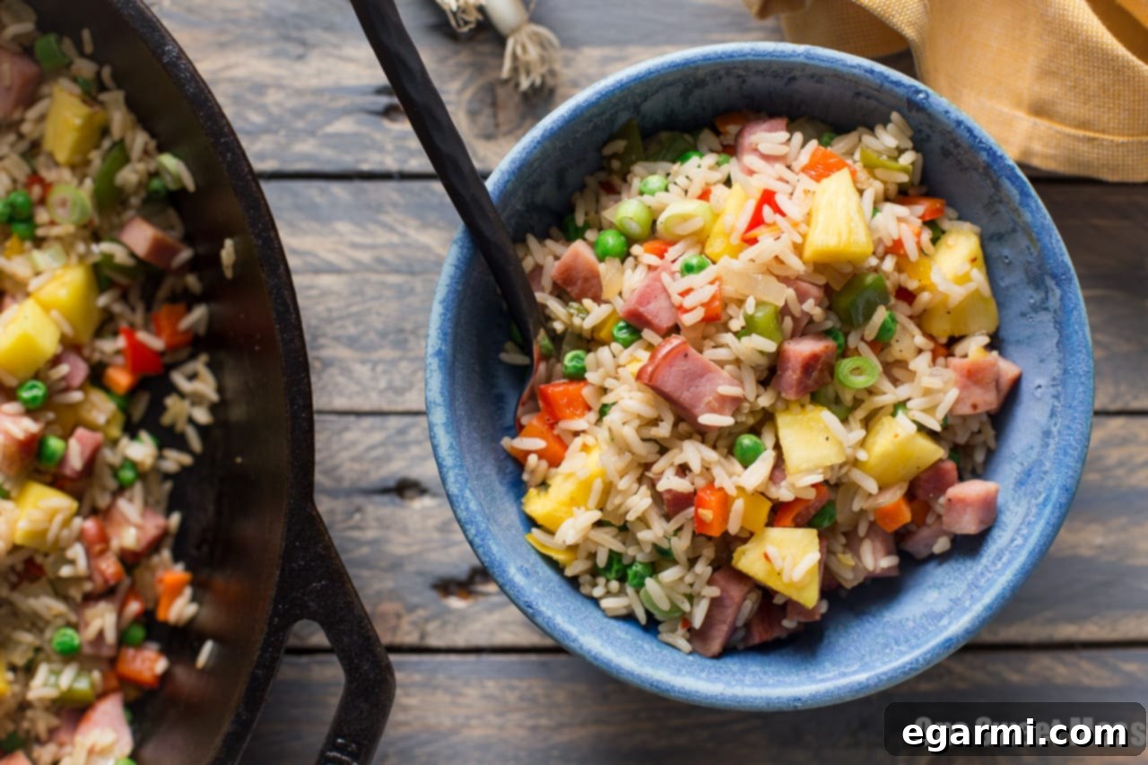 Pan of freshly cooked Pineapple Ham Fried Rice, ready to serve