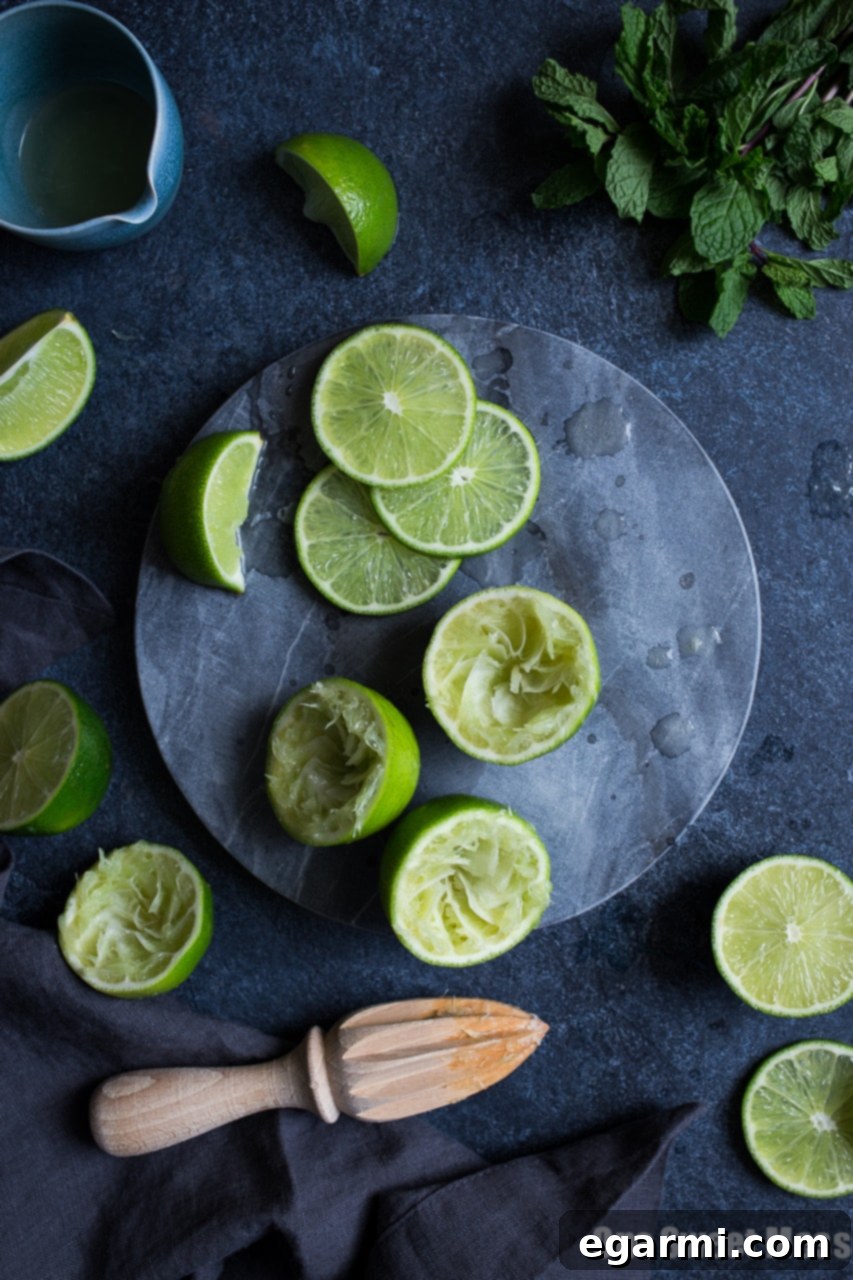 Close-up of a vibrant Pineapple Cranberry Mojito cocktail, highlighting its refreshing qualities