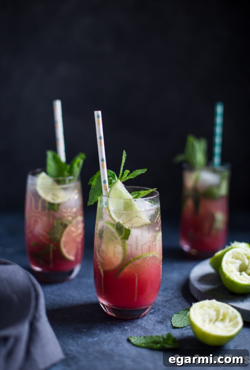 Pineapple Cranberry Mojito being expertly muddled in a cocktail shaker