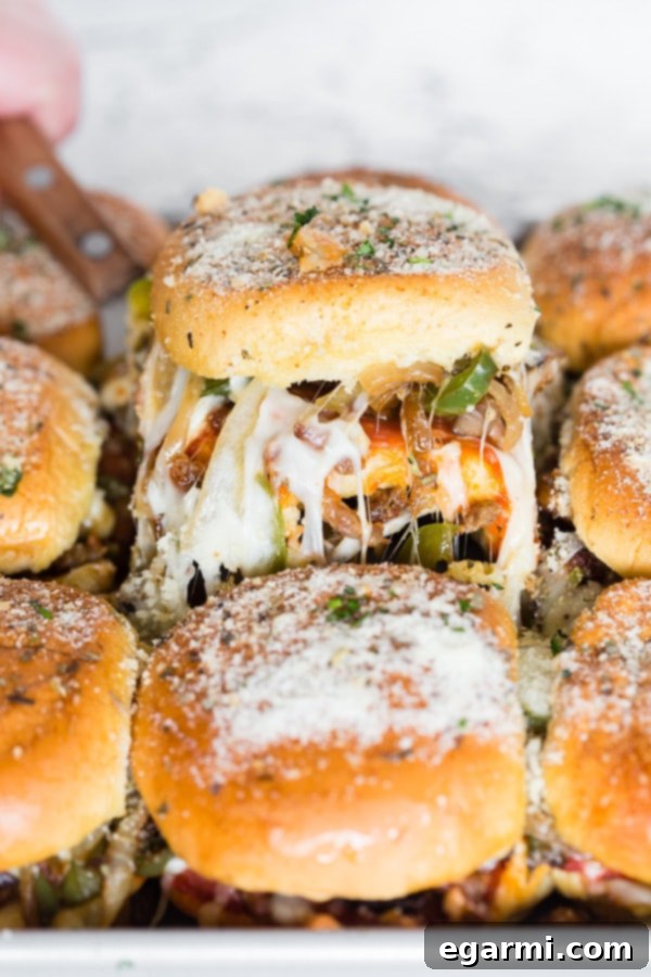 Delicious Supreme Pizza Sliders, baked to perfection with all your favorite pizza toppings for a fun and easy meal