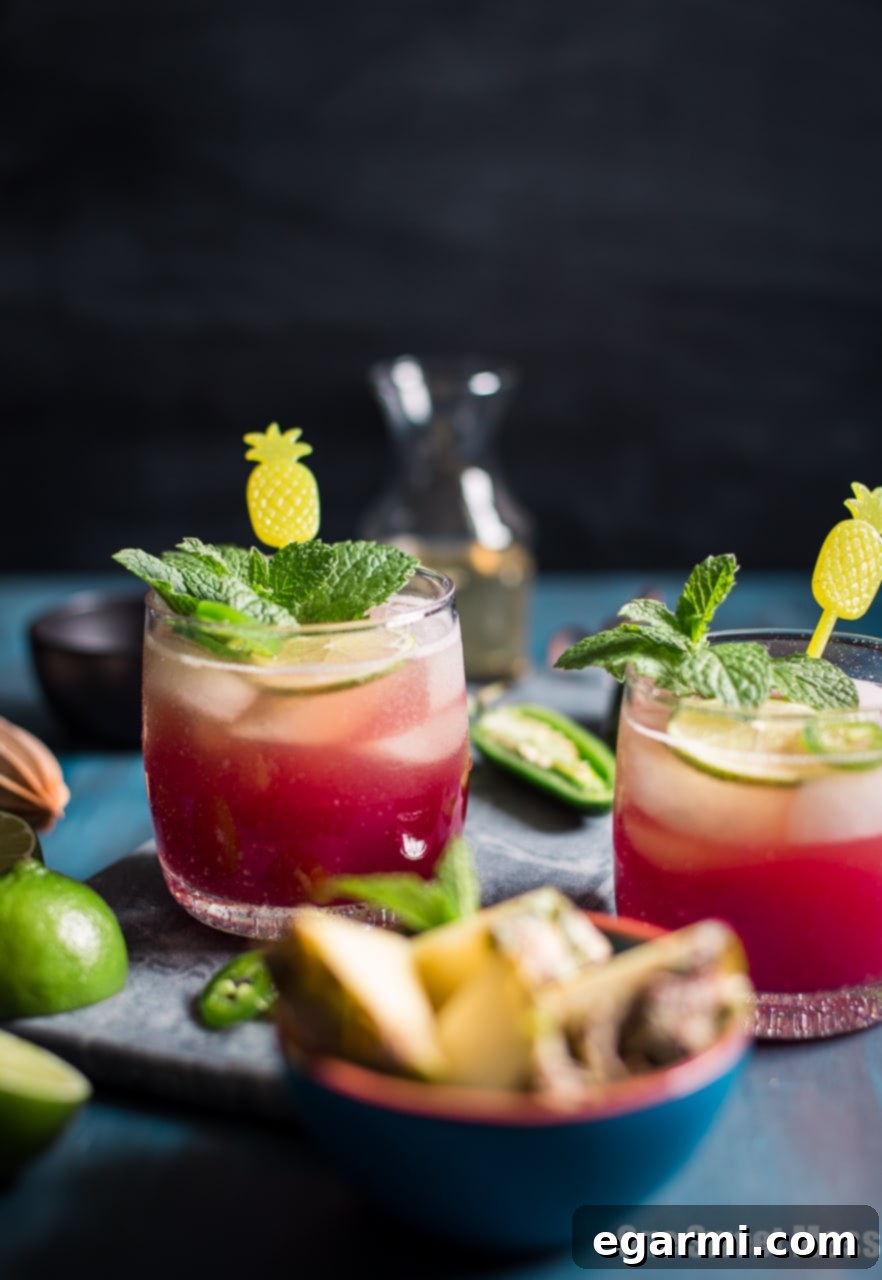 Vibrant Cranberry Pineapple Jalapeño Margarita ready for a celebration
