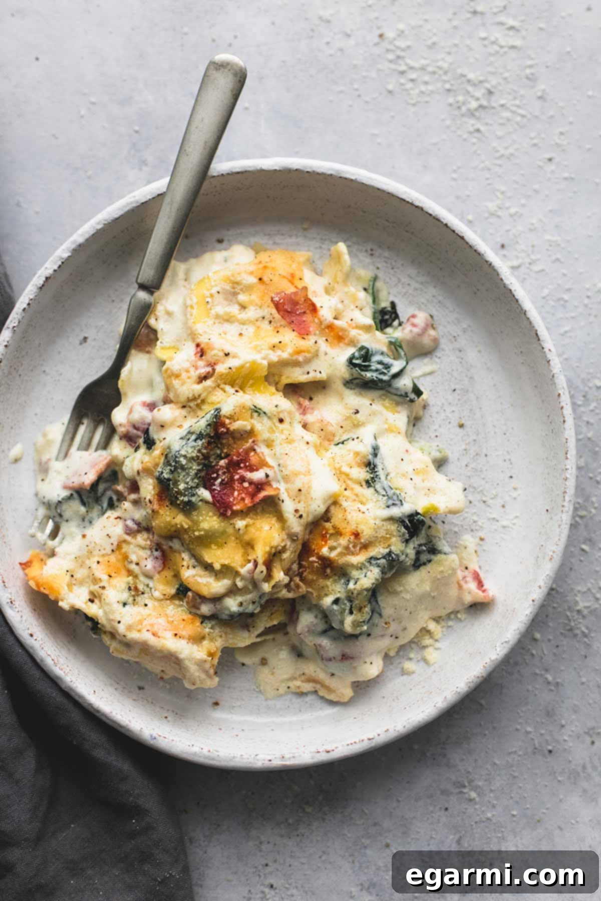 Ravioli Alfredo Bake with Spinach and Bacon - A perfect creamy pasta dish