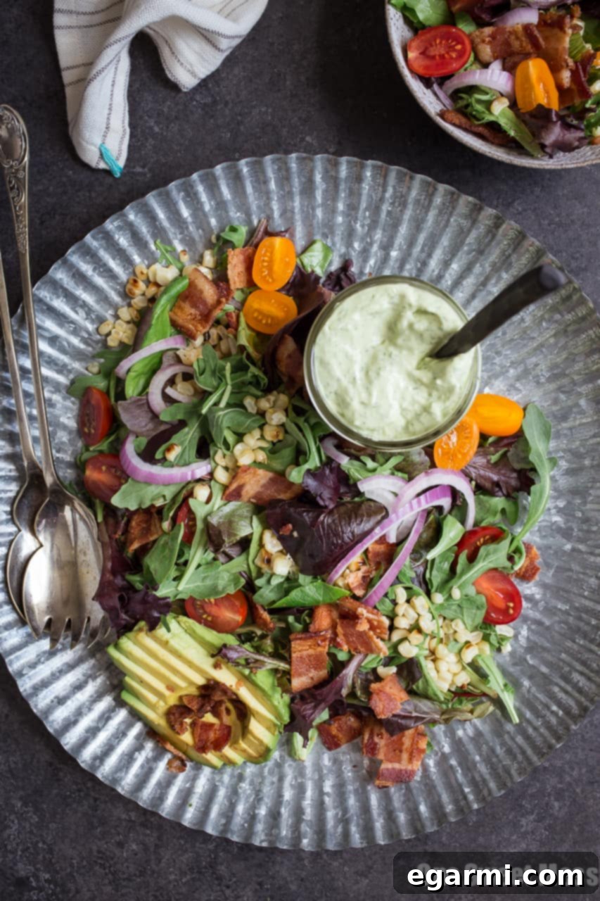 Close-up of BLT Salad with Grilled Corn and Avocado Ranch Dressing ingredients
