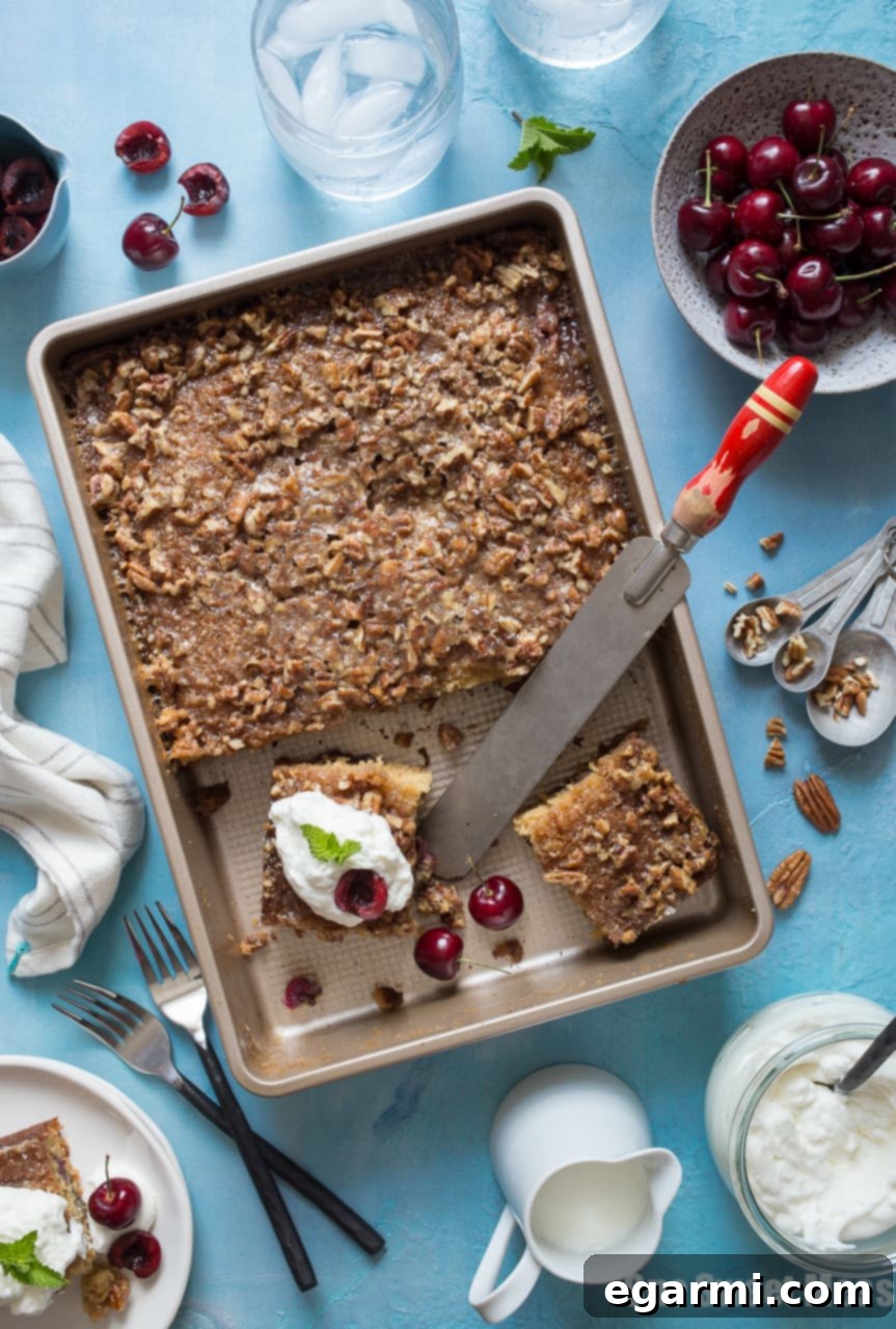Delicious Pecan Glazed Cherry Buttermilk Cake, sliced and ready to serve
