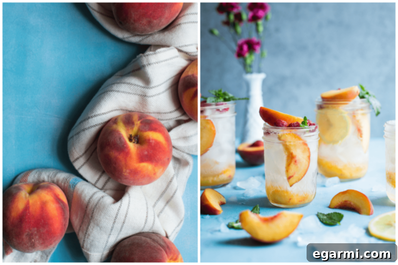 Overhead shot of two Fresh Peach Crush Cocktails on a rustic wooden surface, garnished with lemon and mint