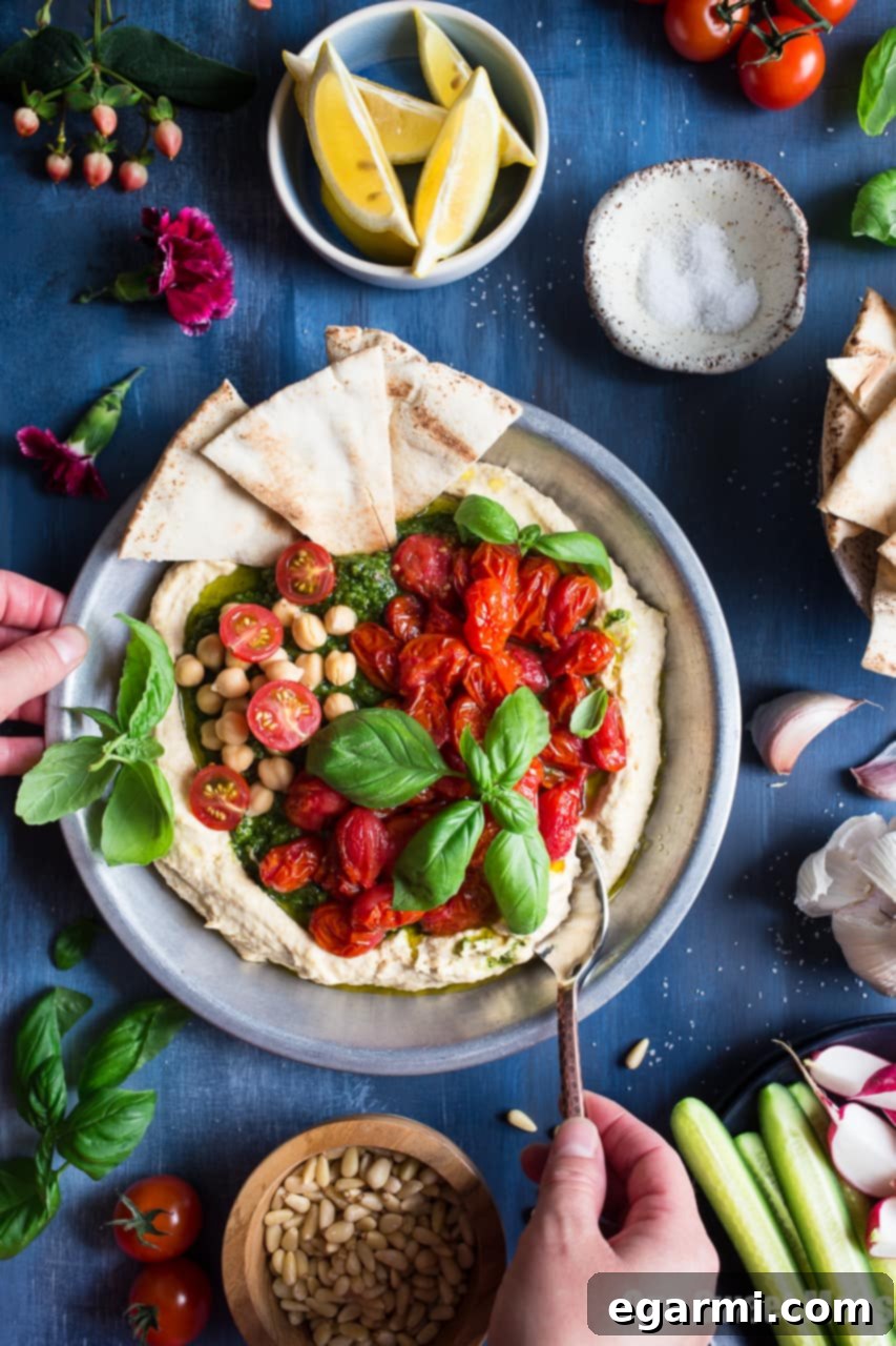 Savory Pesto Hummus with Bursting Roasted Cherry Tomatoes 6 Delicious and Healthy Pesto Hummus, a perfect summer snack
