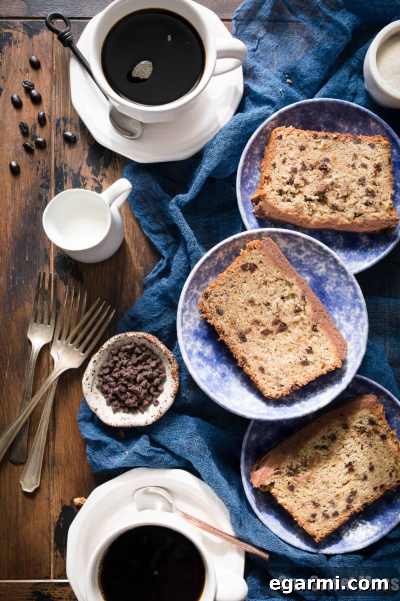 Gluten-Free Chocolate Chip Banana Bread with Mocha Buttercream, sliced with frosting