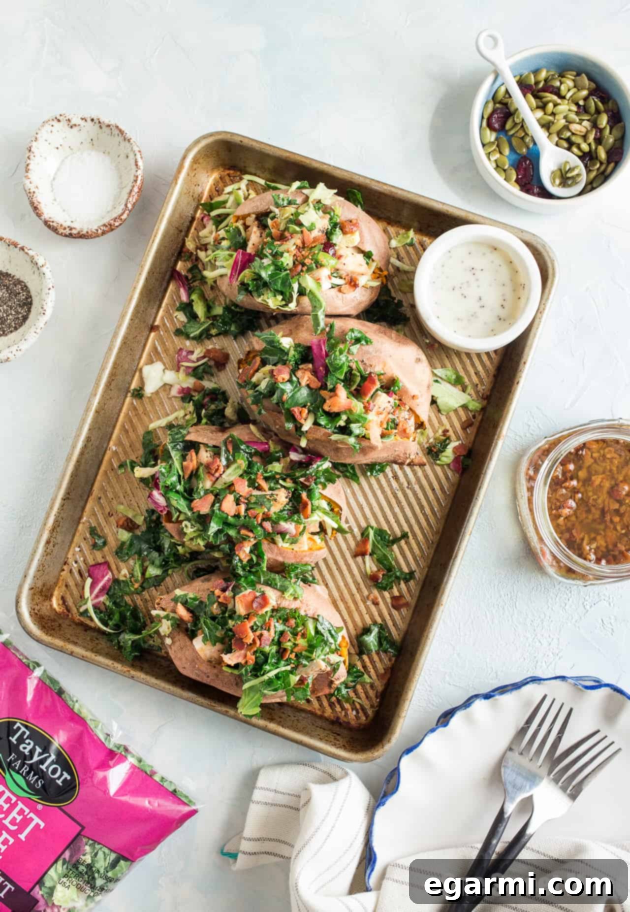 Hearty Grilled Chicken and Sweet Kale Salad Stuffed Sweet Potatoes, a healthy and gluten-free meal loaded with flavor.