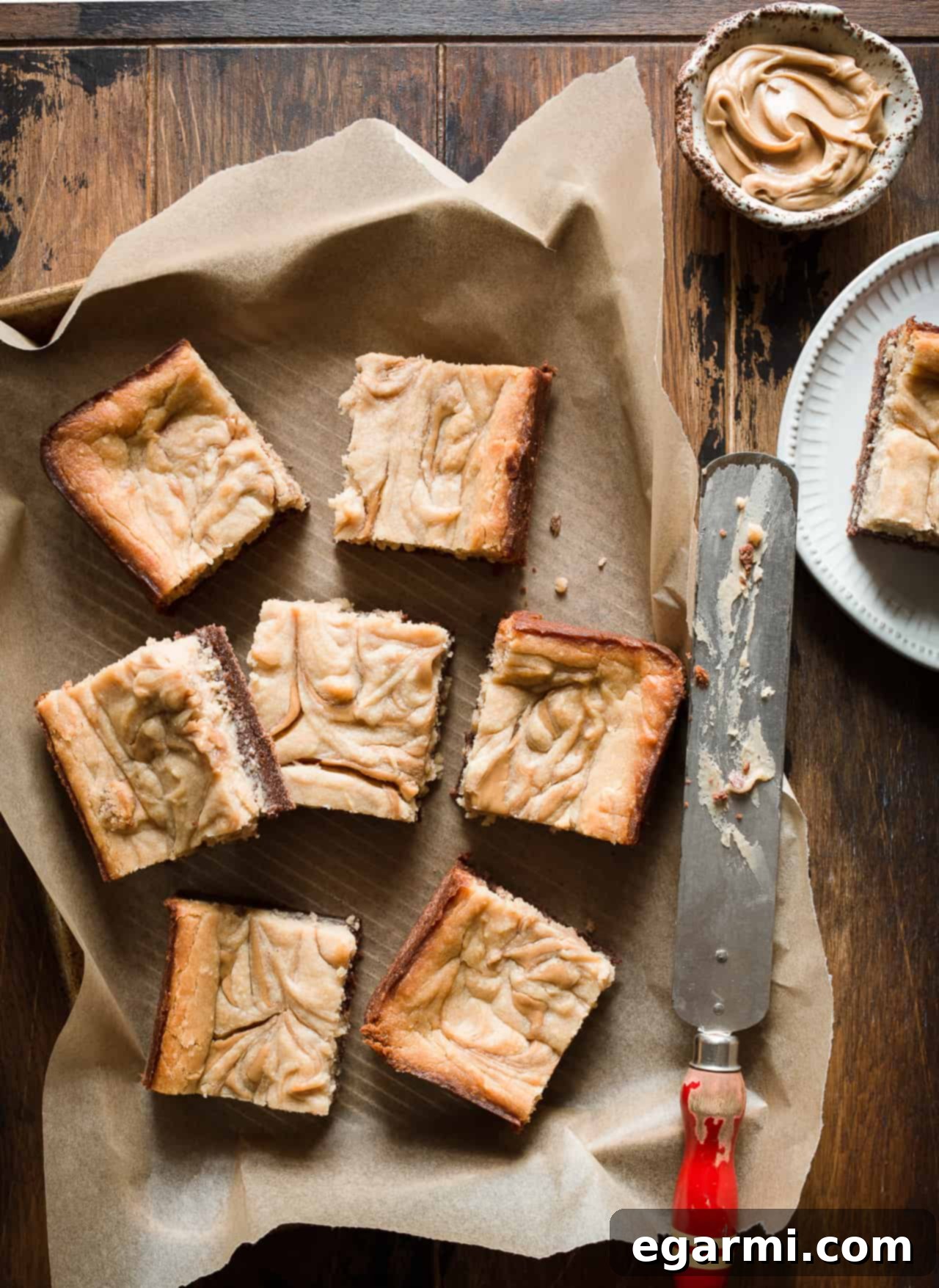 Another perspective of the Gluten-Free Peanut Butter Cheesecake Brownies, highlighting their golden-brown edges and rich, inviting color