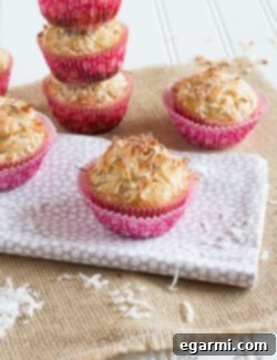A freshly baked Healthy Pina Colada Muffin, ready to be enjoyed.