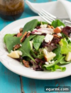 Final plated Winter Salad with Pomegranate Balsamic Vinaigrette