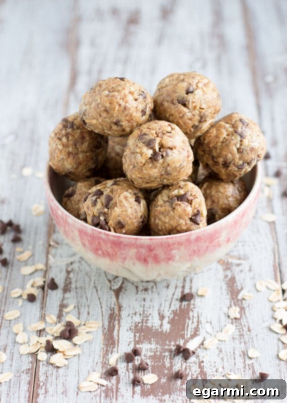 Peanut Butter Oatmeal Bites 2 Delicious Peanut Butter Oat Balls stacked on a plate, ready to eat.