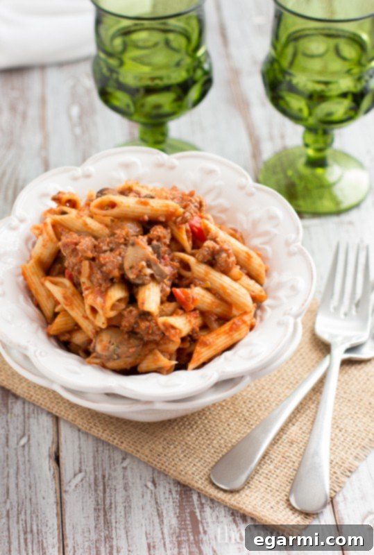 Gallo Family Vineyards Hearty Burgundy wine, a perfect pairing for Sausage & Mushroom Ragu.
