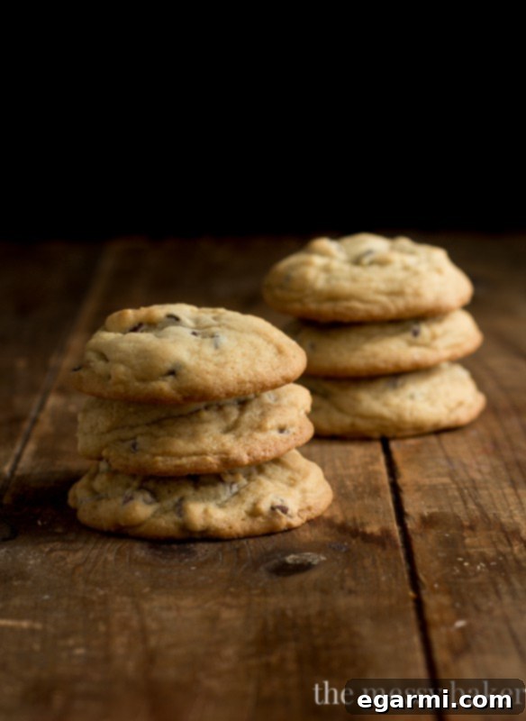 Ingredients for soft batch chocolate chip cookies, including brown sugar and eggs.