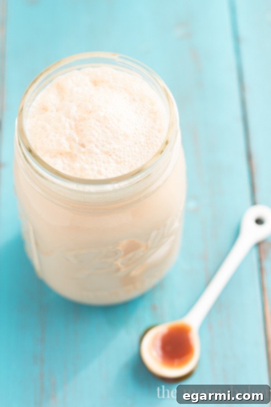 Close-up of Luxurious Homemade Caramel Macchiato Coffee Creamer in a Glass Jar