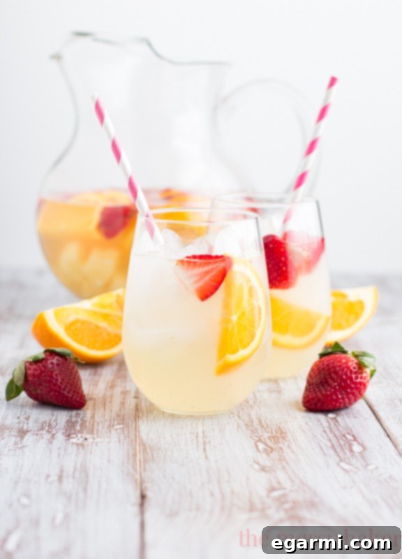 Serving Fruity Pineapple Sangria with Bubbly White Wine
