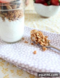 Maple Nut Granola in a bowl with a spoon